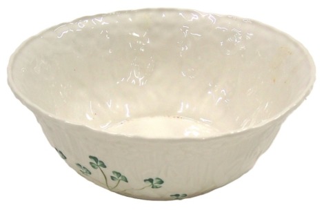 A modern Belleek bowl, on a cream ground with three leaf shamrock, 24cm diameter, boxed.