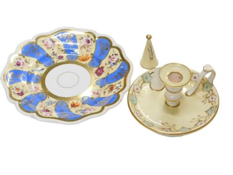 Continental porcelain, comprising a yellow candle stand, and a cabinet plate. (2)