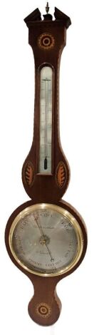 An Edwardian mahogany and marquetry banjo barometer, the circular silvered dial for Moretti and Abatte, with mercury measure, the case inlaid with flower head and shell patera, 100cm high.