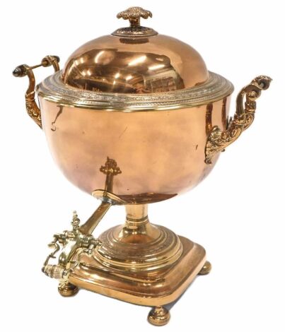 A 19thC copper and brass two handled samovar, of urn shape with floral finial, waisted support and square base with bun feet, 41cm high.