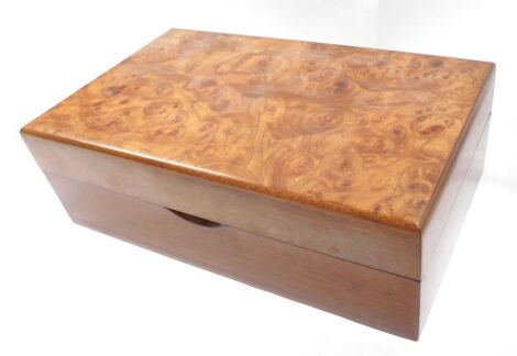 A mahogany and burr elm Brebbia cigar box or humidor, 30cm wde and a cigar cutter.