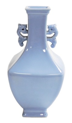 A Chinese porcelain clair de lune bottle vase, of square section with tapering neck and stylized dragon handles. Six character Yongzheng seal mark to base, and possibly of the period (1723 - 1735), 27cm high. Provenance: The John and Margaret Rankine Col