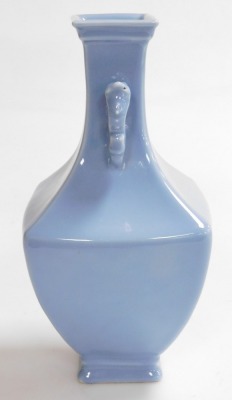 A Chinese porcelain clair de lune bottle vase, of square section with tapering neck and stylized dragon handles. Six character Yongzheng seal mark to base, and possibly of the period (1723 - 1735), 27cm high. Provenance: The John and Margaret Rankine Col - 2