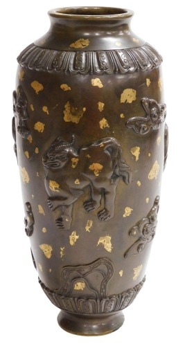 An 18thC Qianlong dynasty Chinese gold splashed ovoid bronze vase, the body with appliqués of mythical animals and clouds with raised petals between lappet bands, 34cm high. Provenance: The John and Margaret Rankine Collection. Accompanied with a copy o