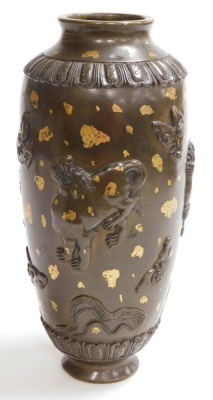 An 18thC Qianlong dynasty Chinese gold splashed ovoid bronze vase, the body with appliqués of mythical animals and clouds with raised petals between lappet bands, 34cm high. Provenance: The John and Margaret Rankine Collection. Accompanied with a copy o - 3