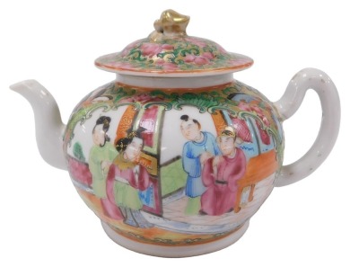 A 19thC Qing dynasty Chinese porcelain miniature teapot, in famille rose Canton style, with figures, birds and flora, the cover with gilt knop, 9cm high.