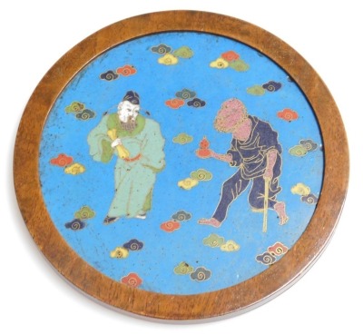 A pair of 17th/18thC Chinese enamel plaques, each with figures of men and women within stylized clouds, in late 19thC rosewood frames, 18cm diameter. Provenance: The John and Margaret Rankine Collection. Accompanied by a copy of the purchaser invoice fro - 2