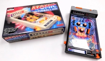 A Tomy Atomic Pinball Arcade action game, Space Tubro ref number 7062, and Gadget Shop air hockey. (3) - 4