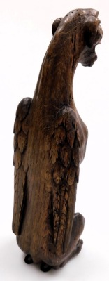 A 19thC carved oak figure of a winged lioness, modelled in standing pose, 37cm high. - 3