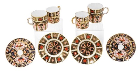 A group of Royal Crown Derby Imari porcelain, comprising two pairs of coffee cups and saucers, 6cm high and 5cm high, some seconds.