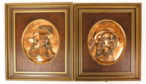 A pair of early 20thC copper plaques, bust profiles of King Charles I and Oliver Cromwell, framed, plaques 25cm x 21cm.