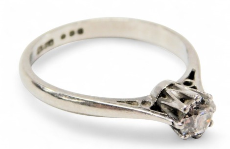 A platinum and diamond solitaire ring, in a high claw setting, approx 0.35ct, size N½, 3.3g.