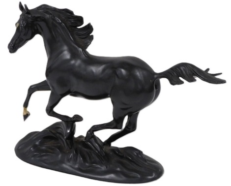 A Franklin Mint porcelain figure modelled as Black Beauty, designed by Pamela du Boulay, 21cm high.