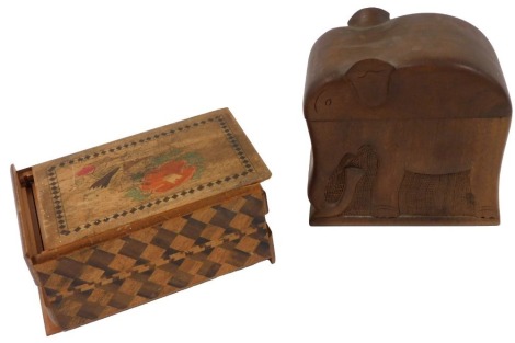 A mid century marquetry inlaid Triok box, 14cm wide, together with a wooden cigarette dispenser of elephant form, 13cm high.