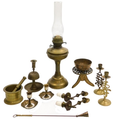 A brass pestle and mortar, Sherwood's brass oil lamp, with glass chimney, pair of Chinese brass candlesticks, and further brassware. (a quantity)