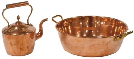 A Victorian copper and brass kettle, 28cm high, together with a copper preserve pan, with two brass handles, 38cm diameter.