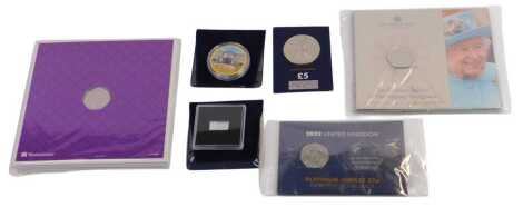 A collection of presentation coins and collecting packs, comprising The Platinum Jubilee National Anthem 50p Coin Collection, in presentation sleeves, Platinum Jubilee 50p Coin collecting pack, The Westminster London 2021 Silver Bar, Royal Mint 70 Years o