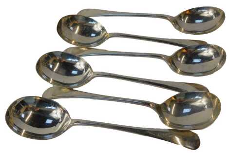 Six George V silver Old English pattern soup spoons, Sheffield 1922 and 1928, 11.56oz.