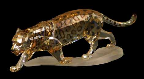 A Swarovski crystal jaguar, 7cm high, boxed.