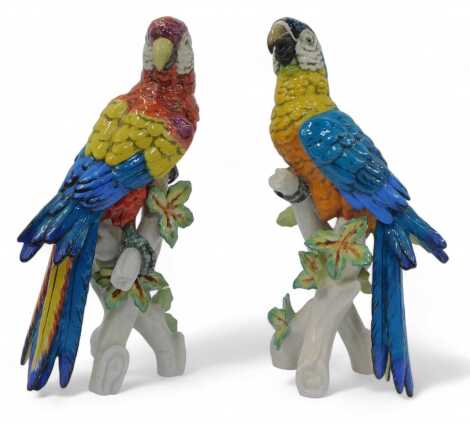 A pair of Salvador Mallol porcelain figures, modelled as parrots, printed marks, 36cm high.