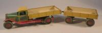 A Wells made tin plate timber truck and matching trailer