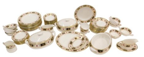 A Royal Crown Derby Derby Border pattern part dinner service, to include a large number of plates of different sizes, three tureens (one AF), sauce boat, two handled soup bowls, etc.