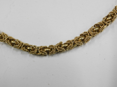 A Byzantine neck chain, on a clip clasp, stamped 14k, 43.7g. - 2