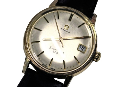 An Omega Seamaster 600 gentleman's gold plated wristwatch, circular champagne dial with batons, centre seconds, date aperture, on a leather strap.