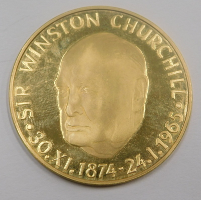 A Winston Churchill 1874-1965 yellow metal medallion, the reverse titled 'Victory', stamped 0.900, 15.7g. - 2