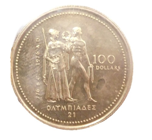 A Canadian Olympic one hundred dollar Montreal 1976 yellow metal coin, 7.77g.