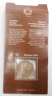 A Canadian Olympic one hundred dollar Montreal 1976 yellow metal coin, 7.77g. - 3