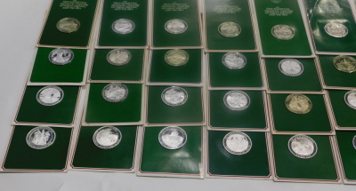 Sixty three John Pinches silver medallions, the Mountbatten Medallic History of Great Britain and The Sea series, mainly mounted in green card. - 3