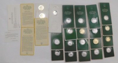 Sixty three John Pinches silver medallions, the Mountbatten Medallic History of Great Britain and The Sea series, mainly mounted in green card. - 6