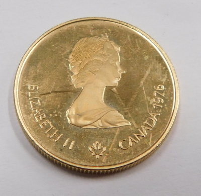 A Canadian Olympic yellow metal proof one hundred dollar coin, in 22ct, with certificate and packaging. - 2