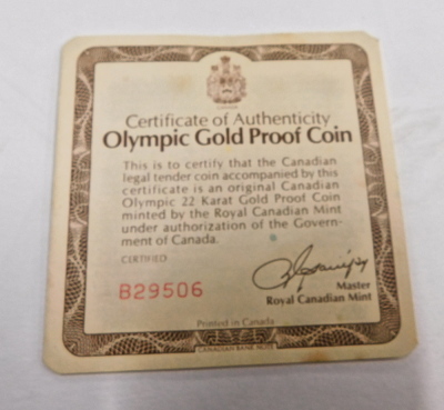 A Canadian Olympic yellow metal proof one hundred dollar coin, in 22ct, with certificate and packaging. - 3