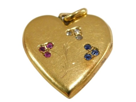 A heart shaped pendant, set with diamonds, rubies and sapphires, in a floral design, yellow metal, stamped 750, 6.3g.