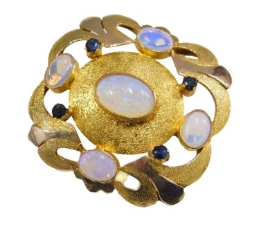 A fire opal and sapphire brooch, in two colour yellow metal, bears marks, 11.4g.