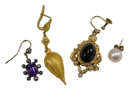 Four 19th/20thC single earrings, comprising a cabochon garnet and seed pearl pendant earring, in a foliate scroll mount, an old cut diamond and amethyst earring, an Etruscan style drop earring, with single diamond, and a cultured pearl earring.