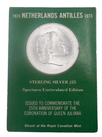 A 1973 Netherlands Antilles sterling silver specimen uncirculated edition coin, in original packaging.