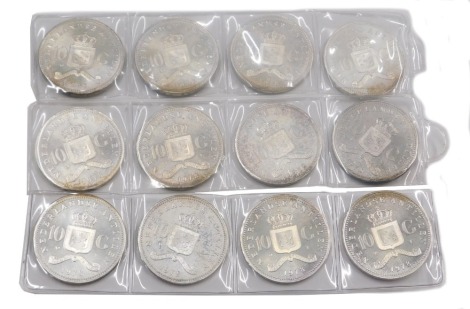 Twelve Netherlands Antilles 1978 ten guilder coins, uncirculated.