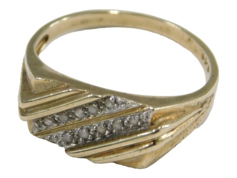 A 9ct gold and diamond ring, set with two rows and channel set brilliant cut diamonds, size Y½, 4.2g.