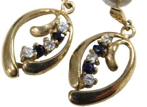 A pair of 9ct gold sapphire and cz drop earrings, of scrolling leaf and berry form, 2.1g.