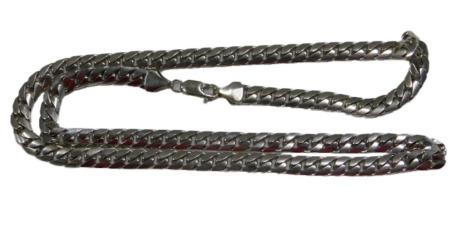 A 9ct gold white gold curb link neck chain, on a lobster claw clasp, 39.3g, 50cm long.