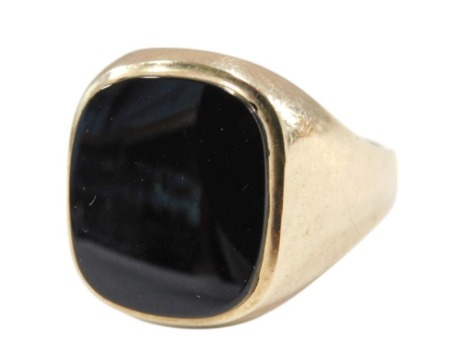 A 9ct gold and black onyx signet ring, size V, 6.9g.