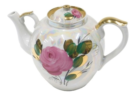 A large Dulevo Russian porcelain teapot, decorated with roses, 32cm wide.