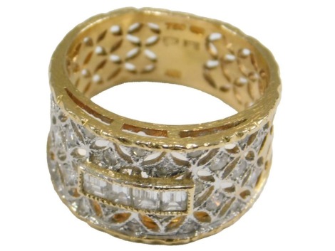 An 18ct gold and diamond Russian style ring, set with four emerald cut diamond, within an open work setting of further brilliant cut diamonds, size K½, 6.0g.