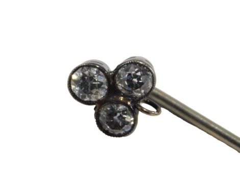 A diamond stick pin, formed as a three leaf clover, approx 0.6ct.