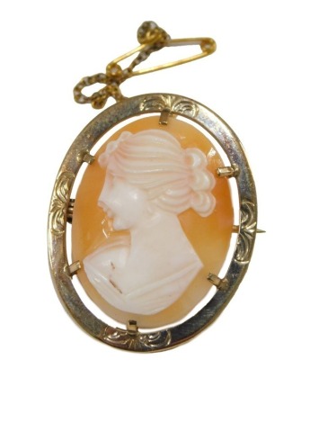 A 9ct gold and shell cameo brooch, bust portrait of a lady, with safety chain as fitted, 4.1g all in.