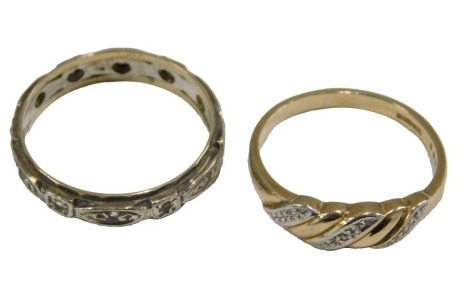 A full eternity ring, set with white stones, in yellow and white metal, size P½, together with a 9ct gold and diamond ring, set with tiny diamonds, in a scroll design, size N, 4.0g all in.