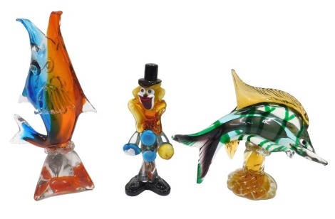 A collection of Continental coloured glass, to include a Murano style clown, and two Czech fish. (3)